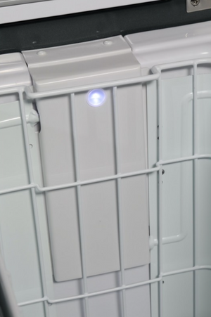 basket of an engel fridge with a small blue led