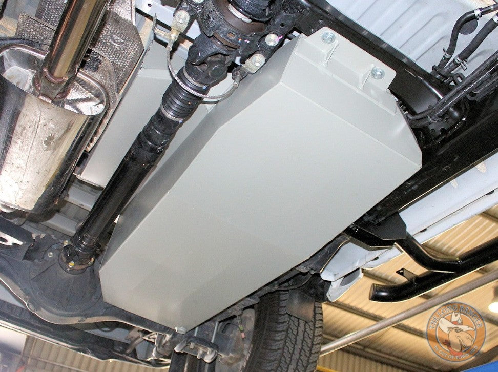 replacement tank mounted under a vehicle