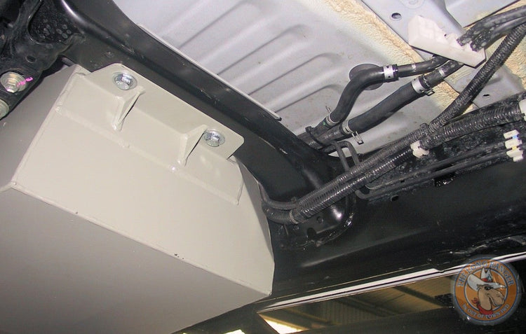 Close-up view of a tank mounting under a vehicle
