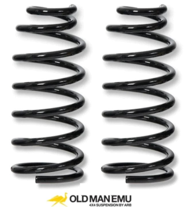 Two black OME springs on white background with yellow logo