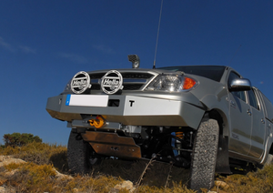 vehicle in a wild landscape equipped with a bumper and LEDs