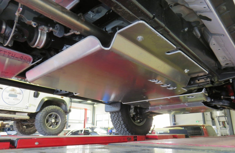 transfer case skid mounted under a vehicle