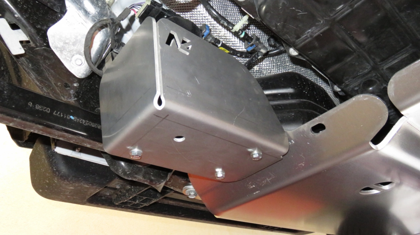 view 3/4 of a transfer and reservoir ski mounted under a vehicle