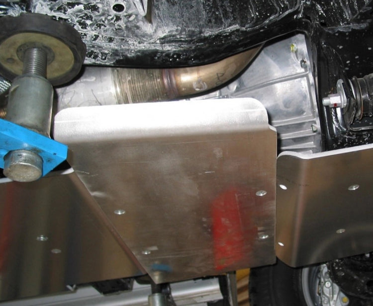 aluminium skid mounted under a dirty vehicle
