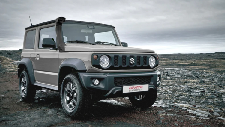 suzuki jimny brown in a rocky landscape