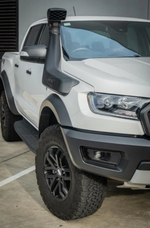 white raptor front view with a black snorkel on the right side