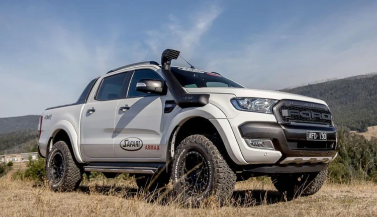white ford ranger with black snorkel on the right front