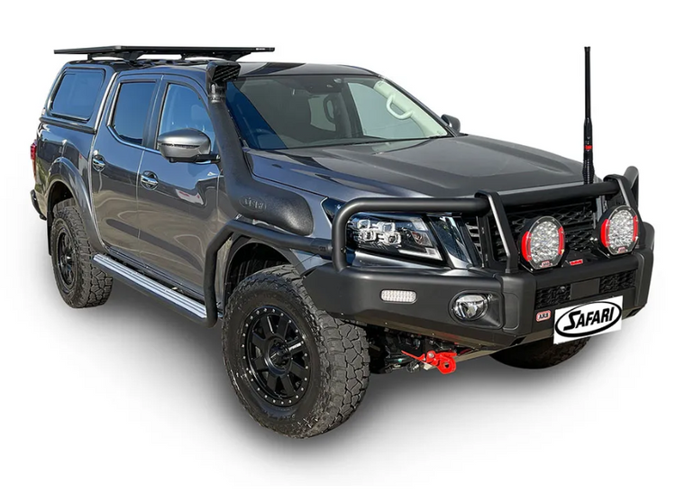 Dark Nissan NAVARA with black snorkel safari 4X4 presented on a white background