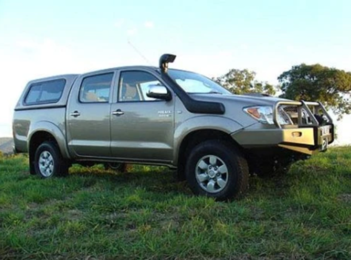 toyota hilux vigo with a Canopy Hardtop and a black snorkel