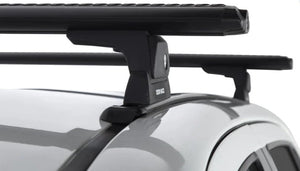 two black roof racks fixed on a grey vehicle