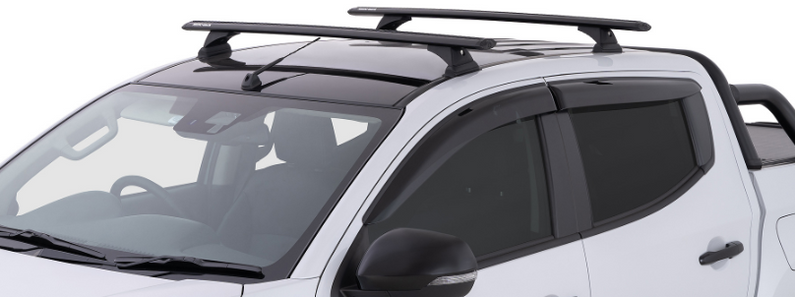 roof of a double cab pickup with two roof racks