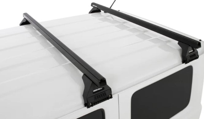 two black crossbars on a white vehicle