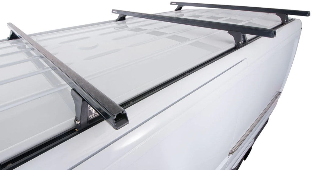 white roof of a vehicle with 3 square roof bars