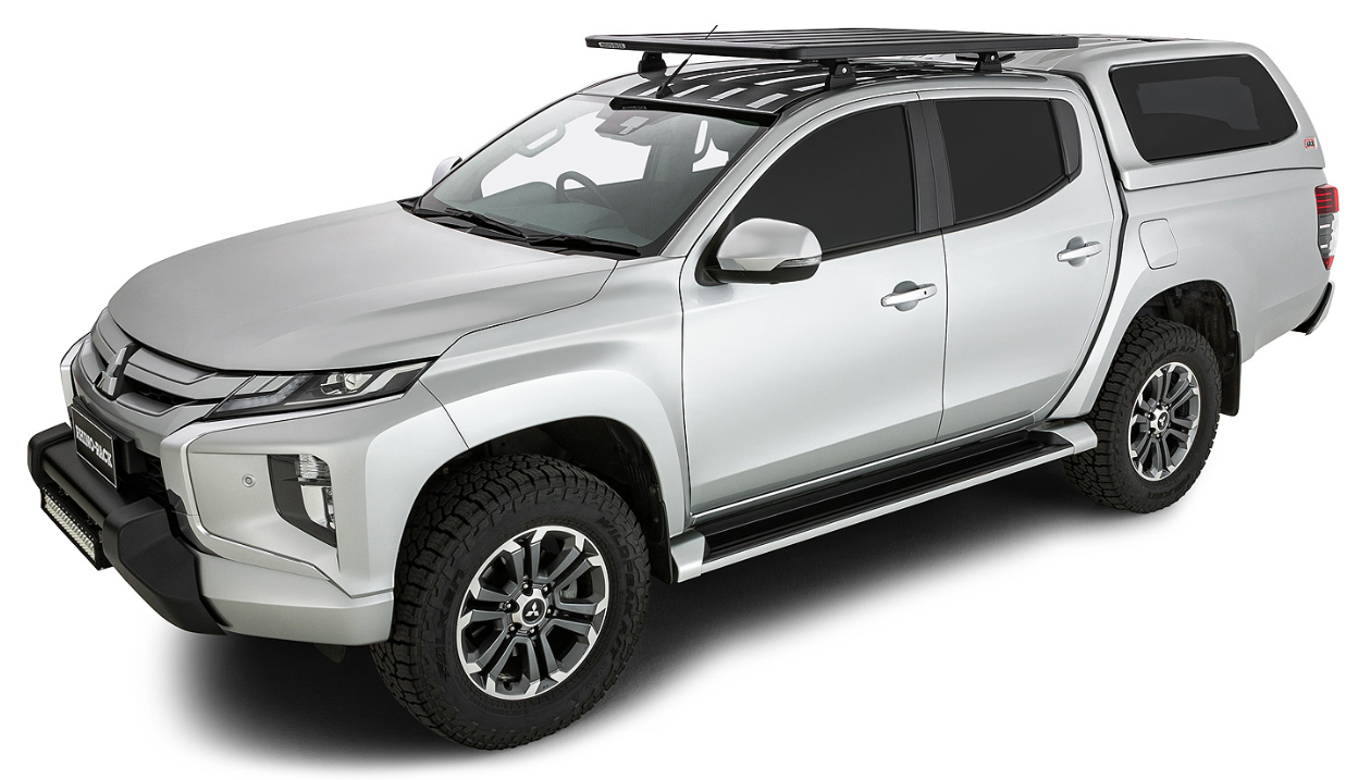 Mitsubishi Triton with a black roof rack on it