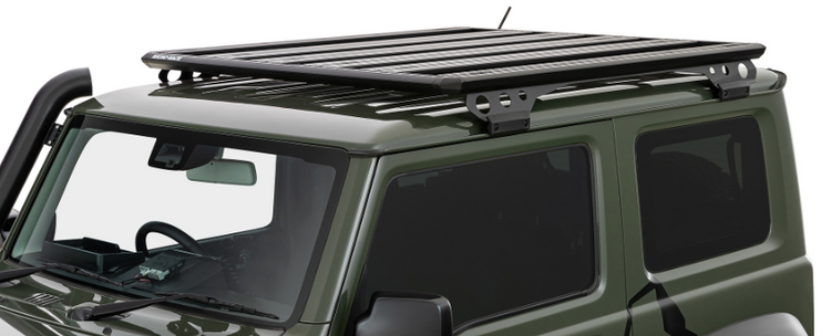 black roof rack on a green vehicle